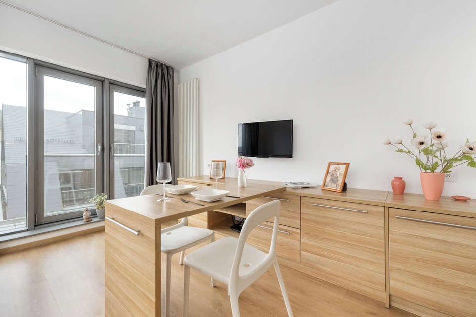 The living area's modern furnishings create a welcoming atmosphere.