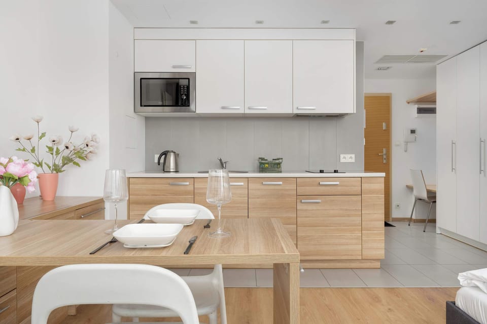 The kitchenette's practical layout maximizes space and functionality.