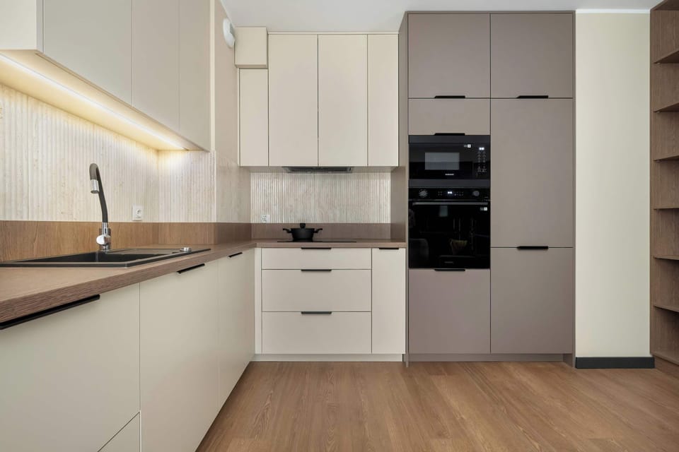 Fully equipped kitchen with wooden countertops and modern appliances for everyday comfort.