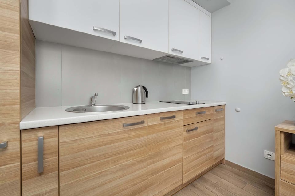 The kitchenette's practical layout maximizes space and functionality.