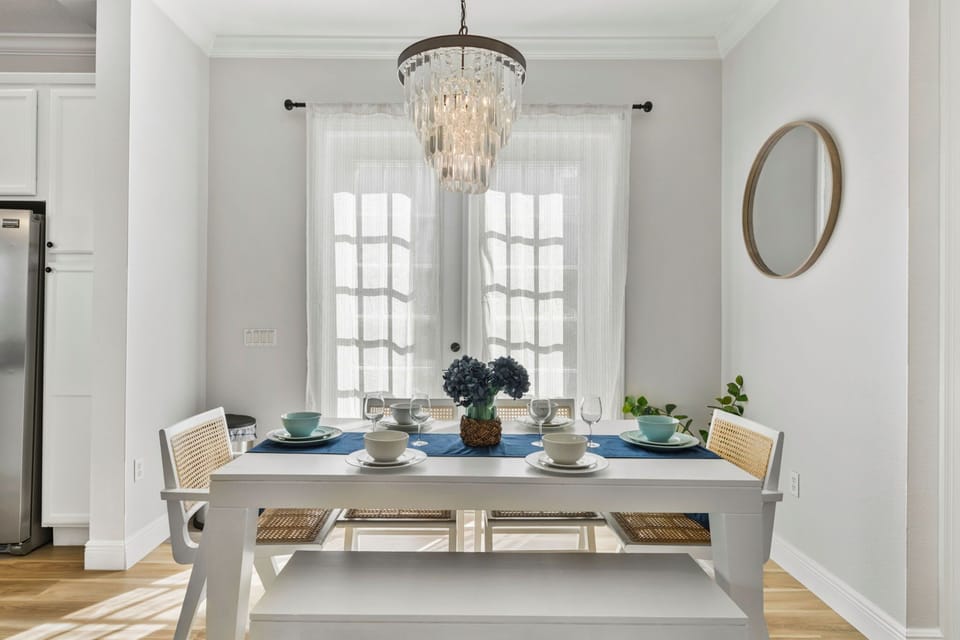 Bright Coastal-Inspired Dining Space with Designer Touches