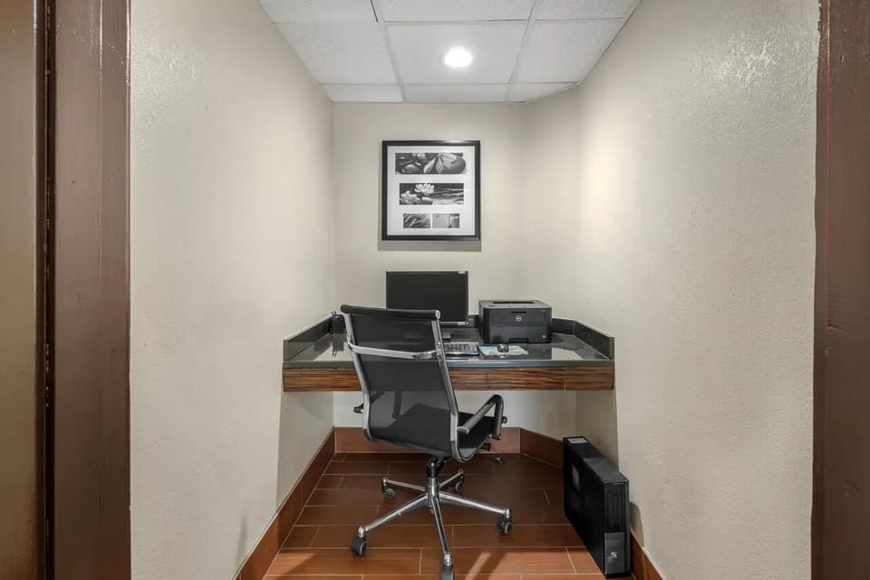 Catch up on work in a quiet, well-lit business nook.