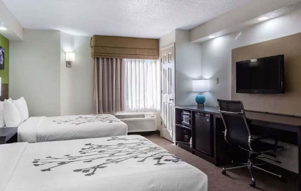 Stretch out, then catch a movie from bed with ease.