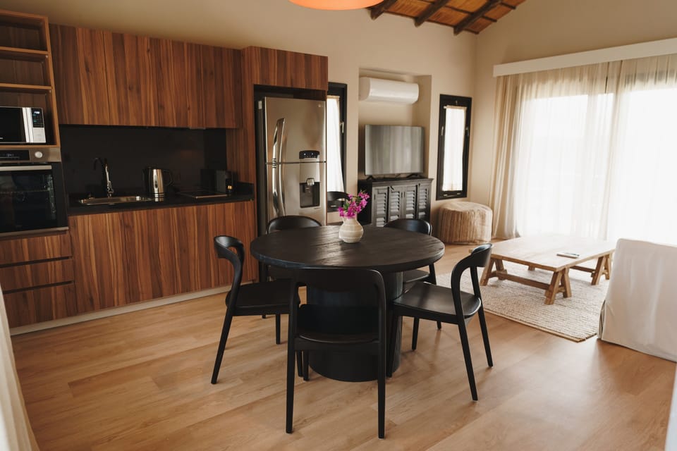 Superior Villa | Living area | 55-inch Smart TV with digital channels, printers