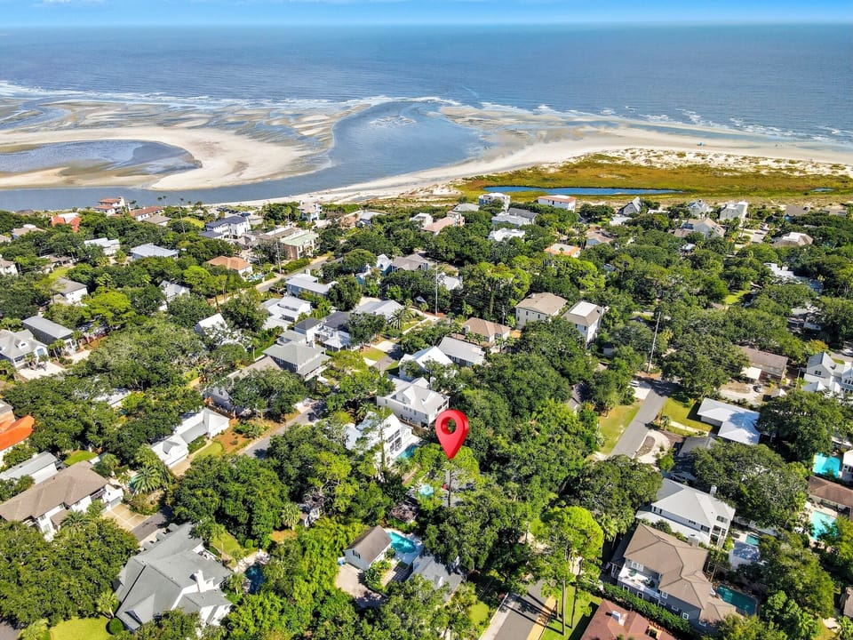 Aerial View Facing East Beach – 4326 12th Street - A true East Beach perspective—just a short stroll from sand and surf. This aerial shot shows 4326 12th Street tucked perfectly between the shoreline and St. Simons’ quiet marsh paths.