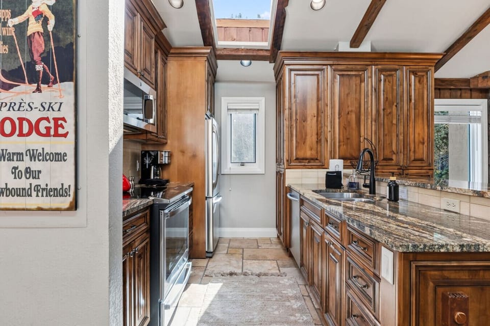 Fully equipped kitchen with bar seating