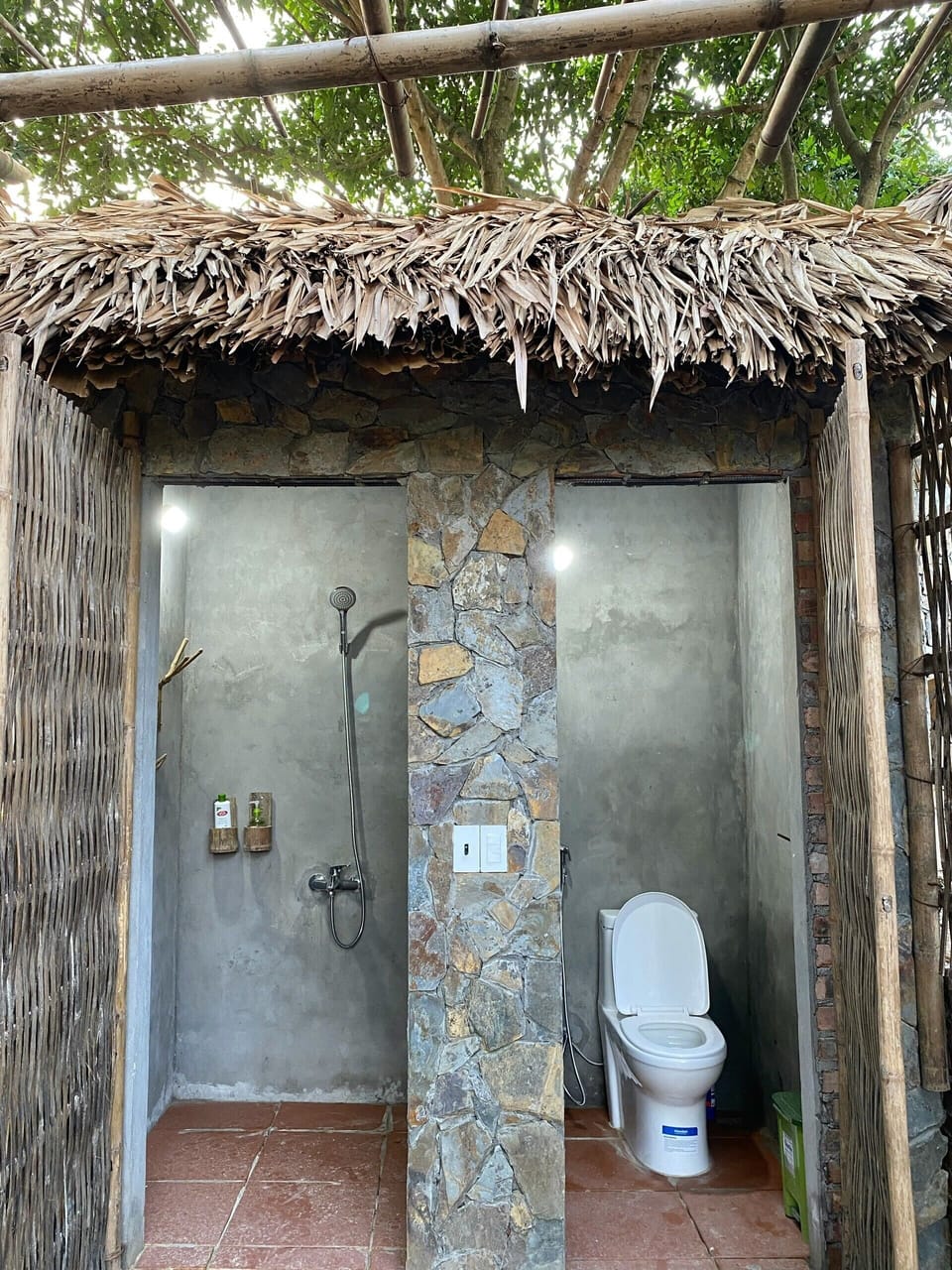 Shower, rainfall showerhead, slippers, towels