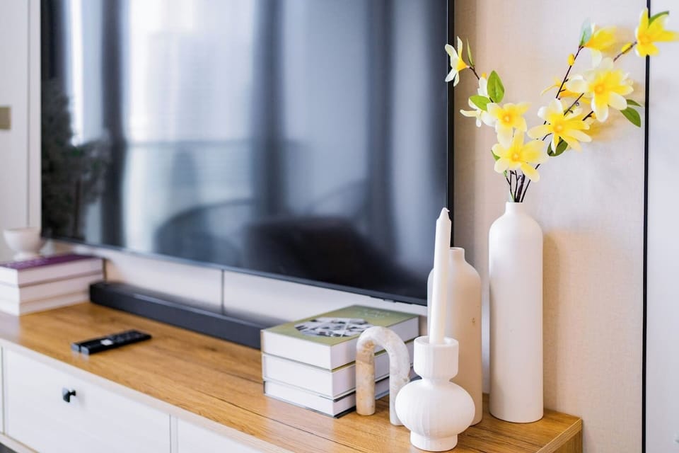 Modern design enhanced by elegant floral arrangements and decorative blooms.