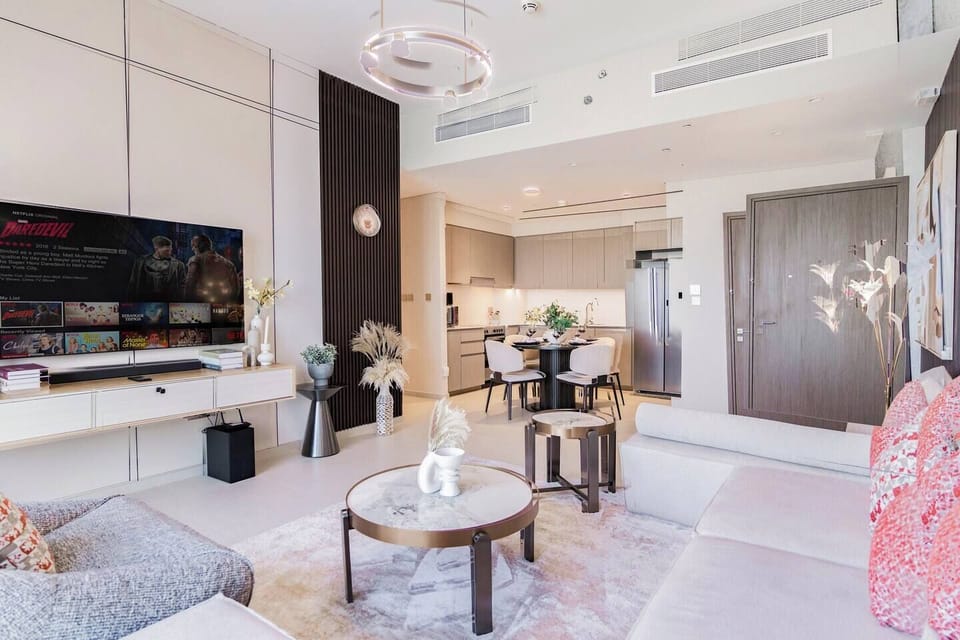 Seamless open concept: Living, dining, and kitchen blend with modern elegance.