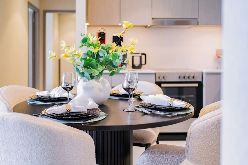 Inviting dining area flows seamlessly into the kitchen for easy entertaining.