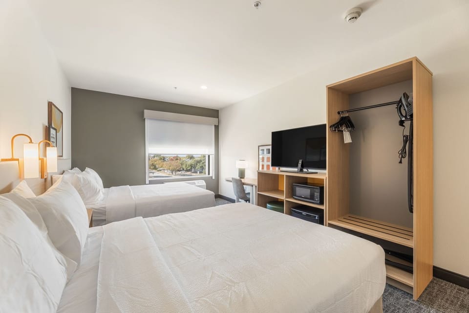 Room, 2 Queen Beds | Desk, laptop workspace, blackout drapes, iron/ironing board