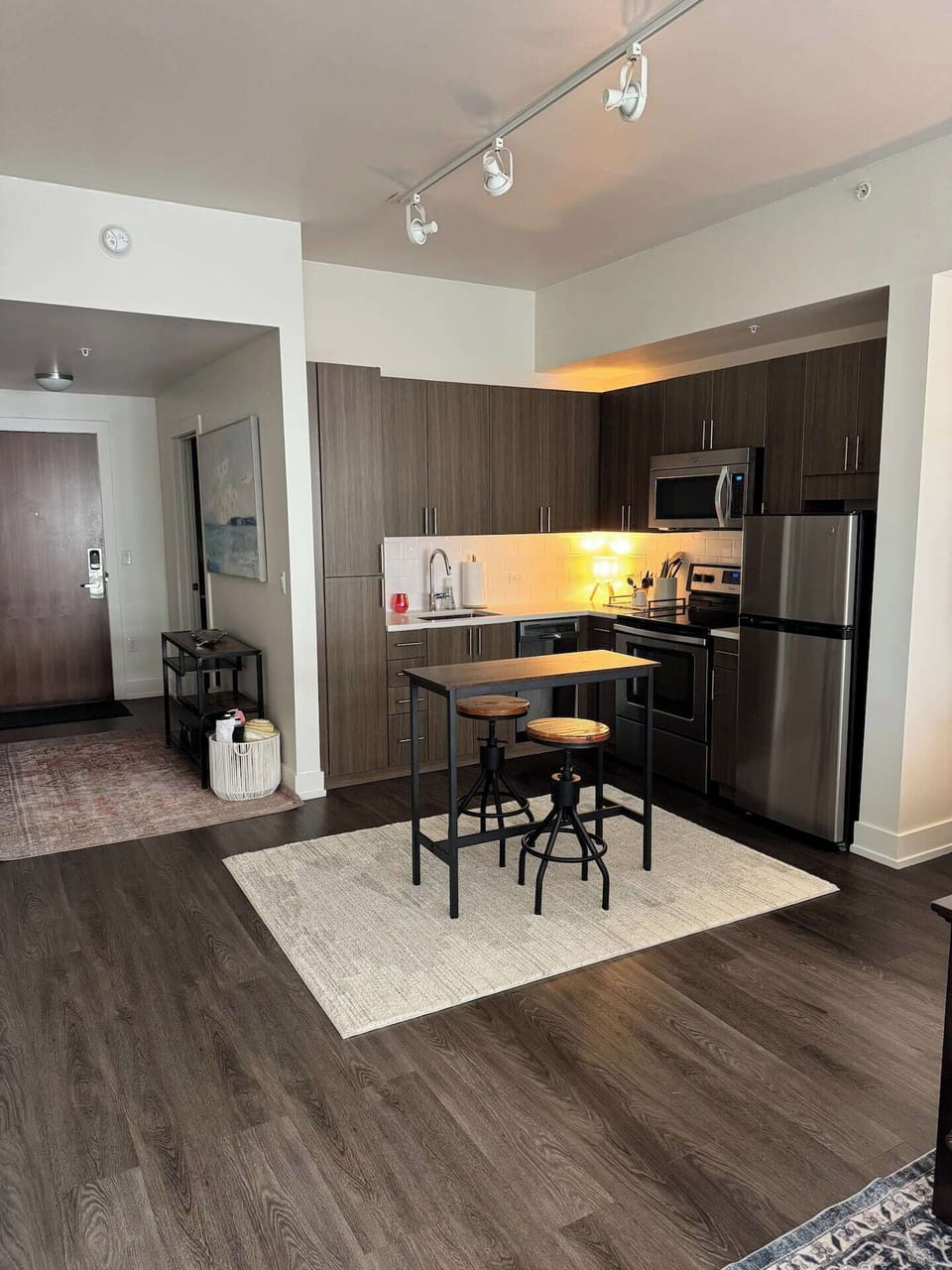 Cook like a chef in the fully stocked kitchen with stainless steel appliances, high-end cookware, and condiments included. Enjoy meals at the dining table before heading out on the town