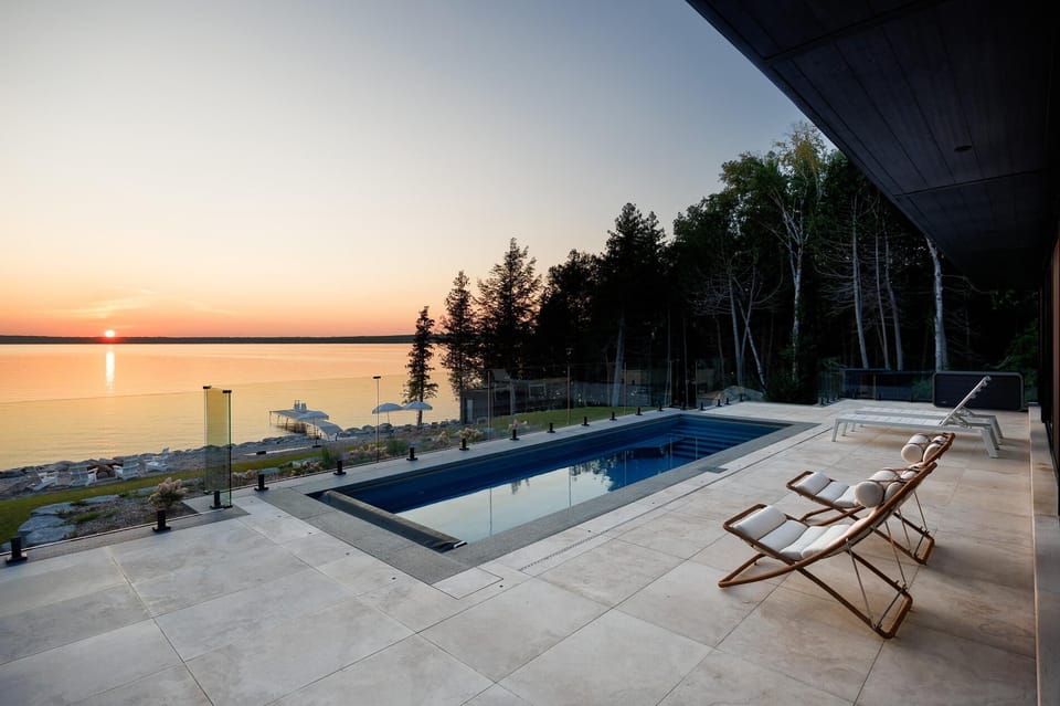 Sunset views from the serene poolside patio retreat