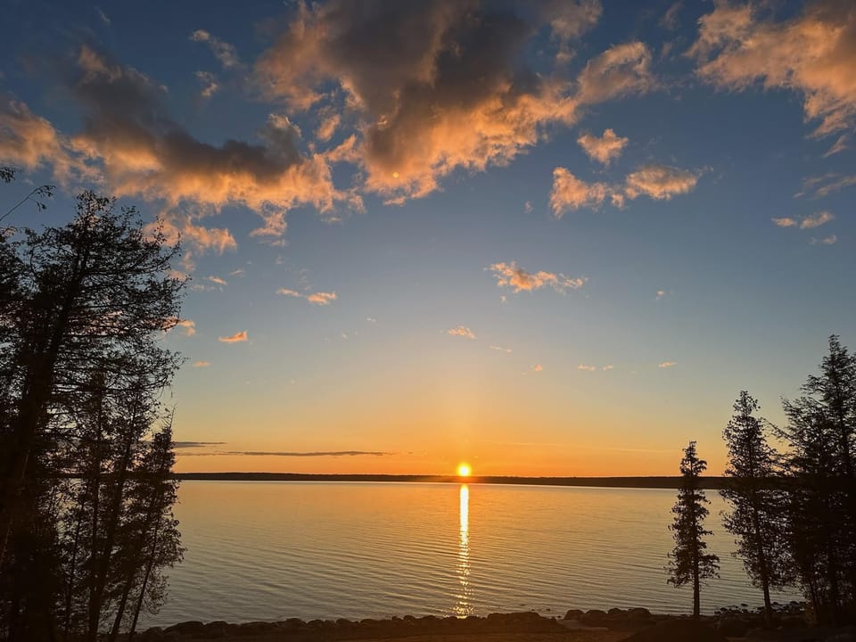 Serene lakeside sunset view for peaceful evenings outdoors