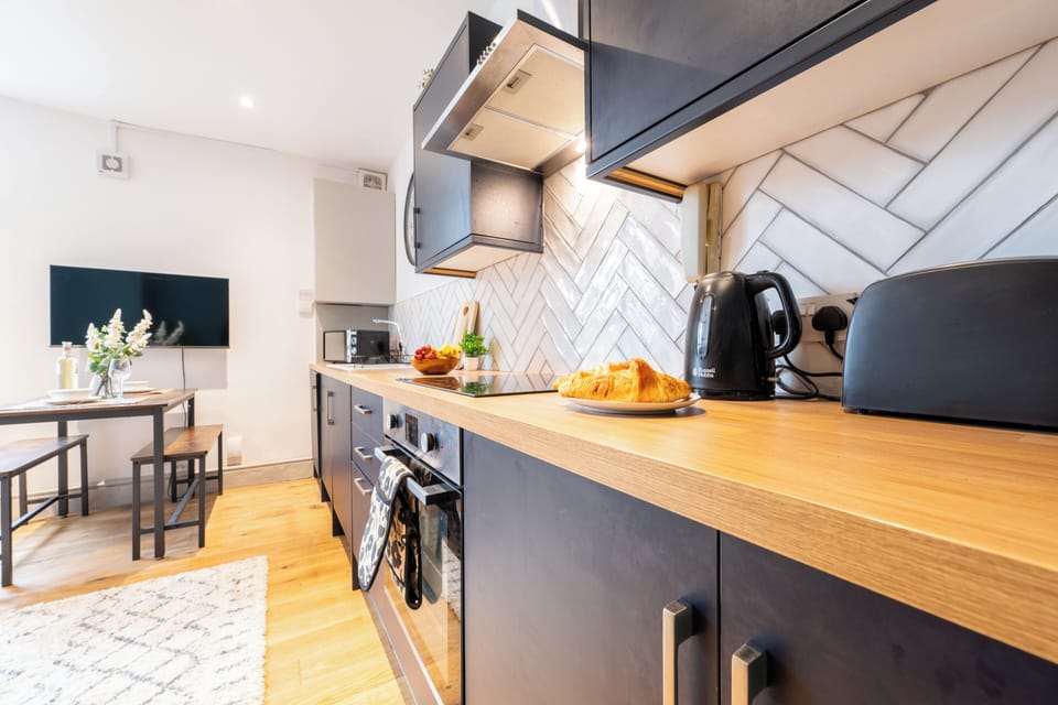 Apartment | Private kitchen | Full-size fridge, microwave, oven, stovetop