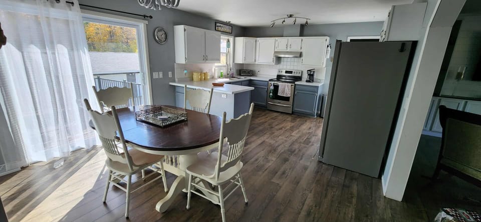 Kitchen with basic cooking utensils.  Everything to prepare/serve meals.