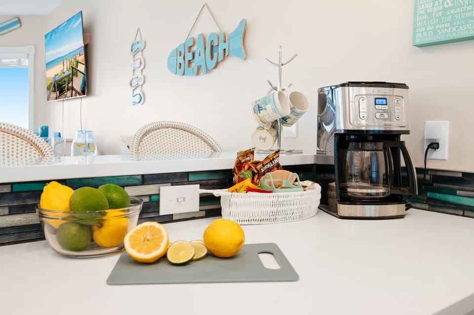 Fuel your seaside adventures at our fully-stocked coffee bar, complete with local favorites and morning essentials. ☕️✨