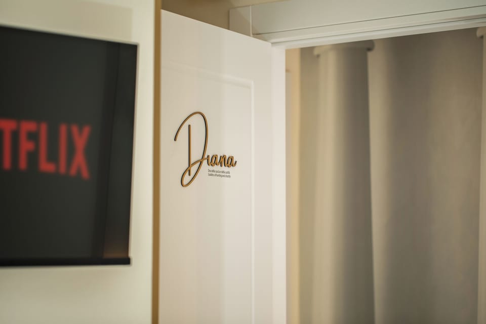 Double Room, Balcony, Courtyard View | In-room safe, desk, laptop workspace, blackout drapes