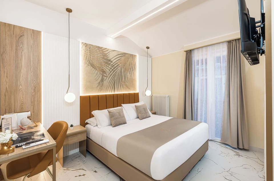 Double Room, Balcony, Courtyard View | In-room safe, desk, laptop workspace, blackout drapes