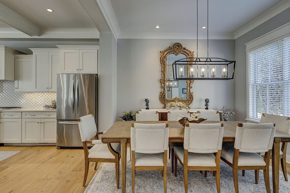 Dining table featuring 8 chairs.