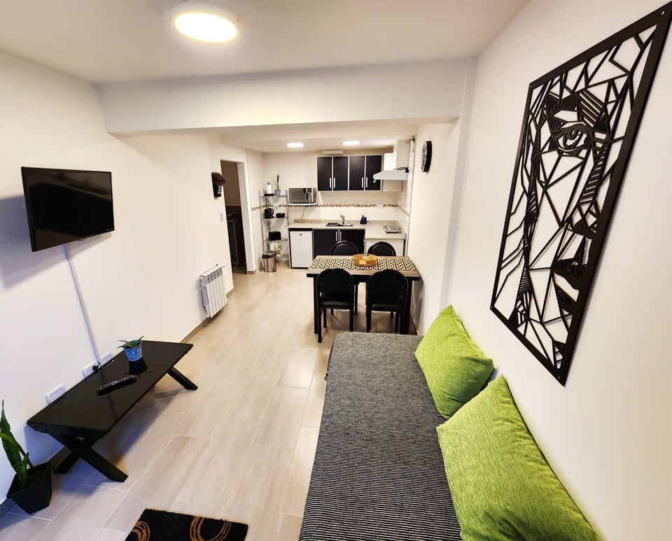Comfort Apartment | Living area | Flat-screen TV