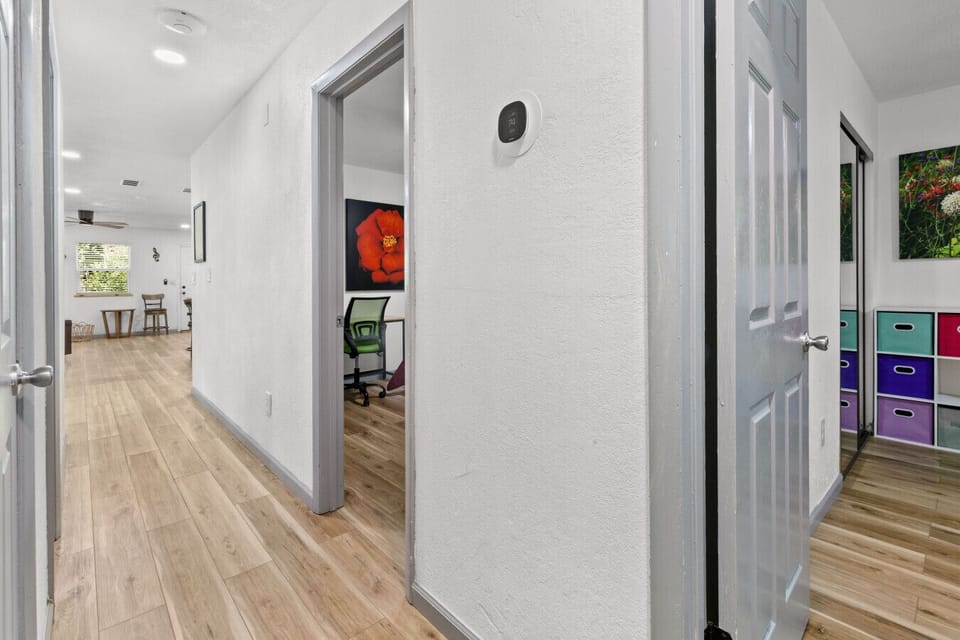 pacious hallway connecting bedrooms, office nook, and main living areas.