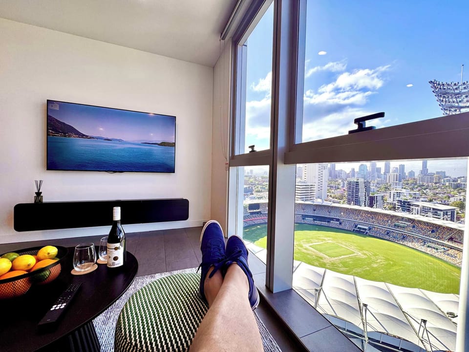 So close you can watch the game and TV at the same time. 