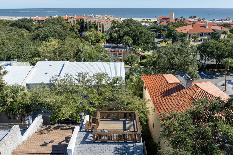 Aerial views of your rooftop deck and proximity to the beach.  (Unit is wooden deck - bottom center)