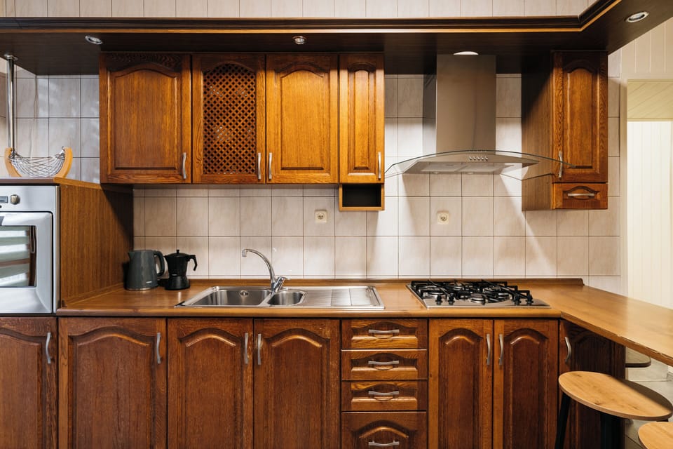 Apartment, Balcony, City View | Private kitchen | Griddle, dining tables
