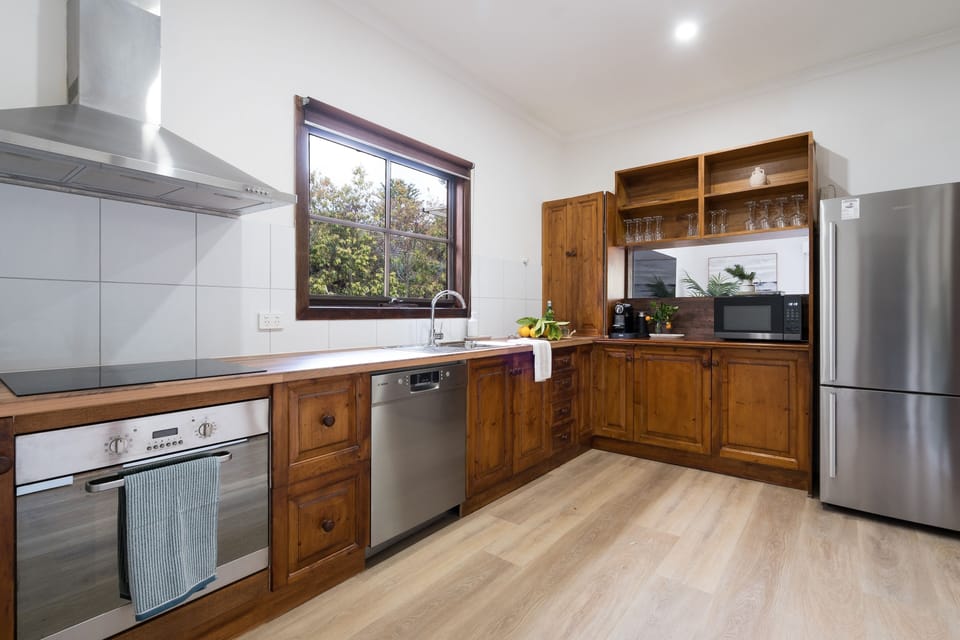 Kitchen with oven, stove, fridge, coffee machine and everything you need for entertaining
