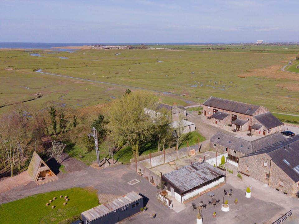 Arial view of Patty's Barn looking out across the salt marsh 