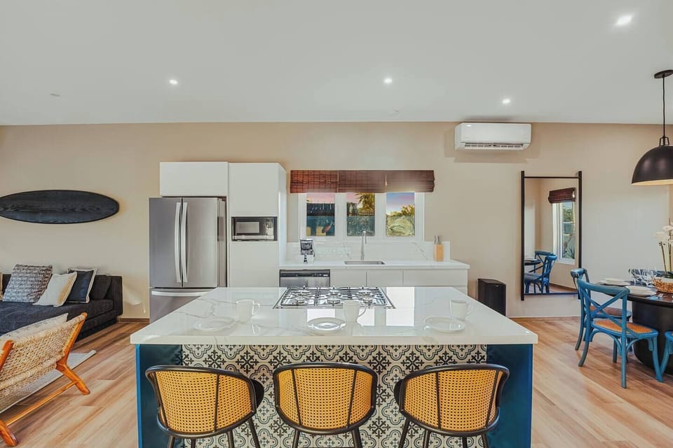 The heart of the home—gather around the island for coffee, meals, and quality time together.