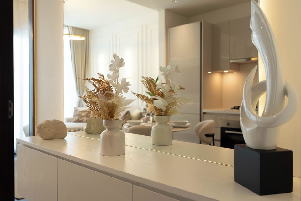 Deluxe Apartment, City View | Living area | 150-inch Smart TV with satellite channels, Netflix, streaming services
