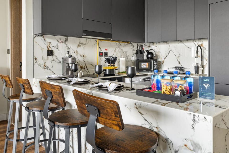 Bright modern kitchen with bar stool