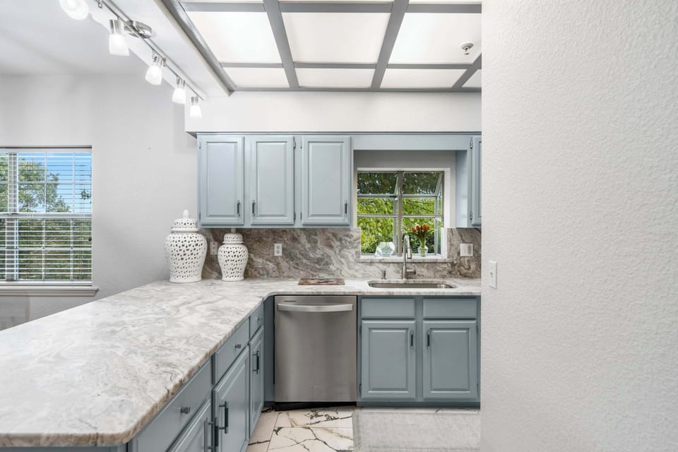 The open kitchen offers ample space & all the comforts of home​