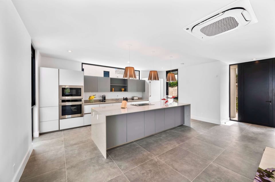 A modern, fully equipped kitchen tailored for refined living