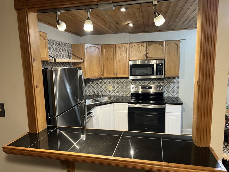 Bar Top to sit and enjoy dinner or a drink. Great open floor plan.