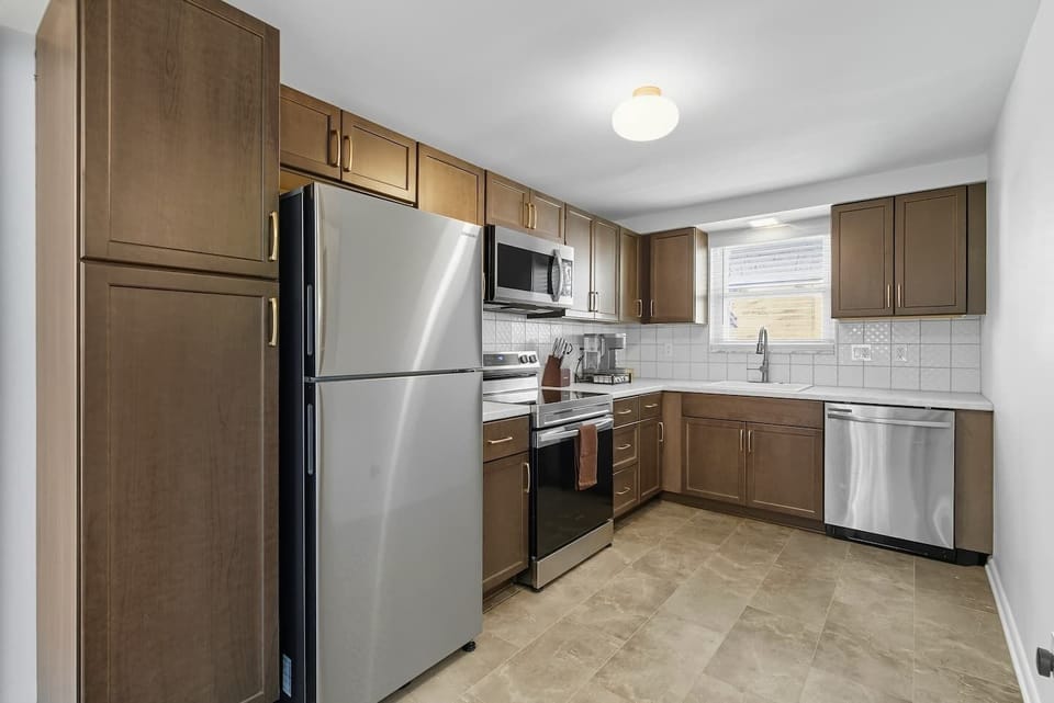 Sleek kitchen with stainless-steel appliances and everything you need.
