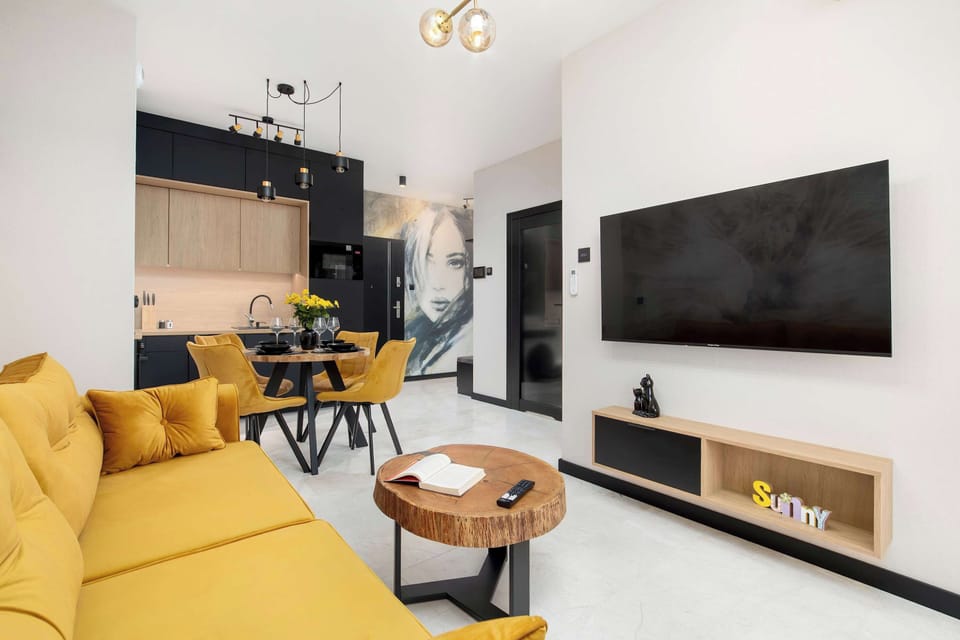 The living room's sleek design is both functional and aesthetically pleasing.