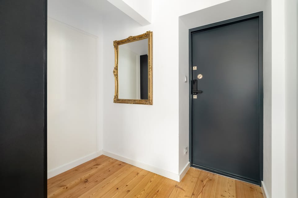 Bright and well maintained entrance hall with secure front door.