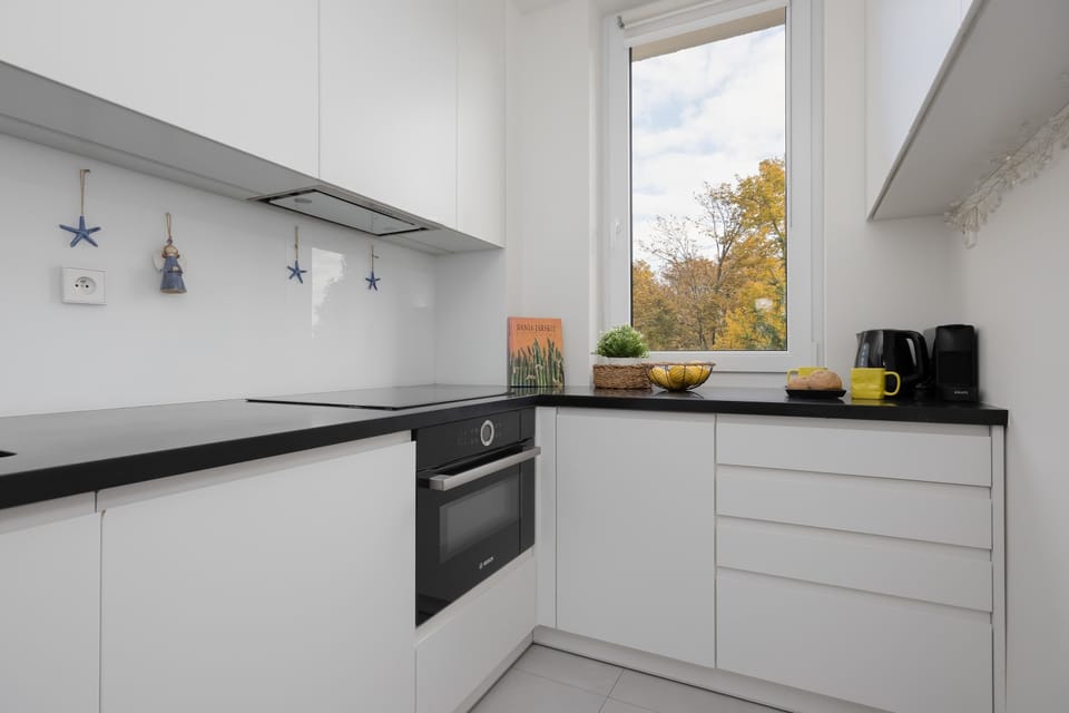 The kitchen's modern appliances make meal preparation easy.
