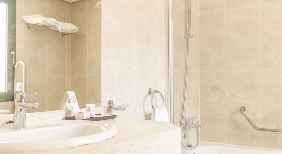 Bathtub, deep soaking tub, free toiletries, hair dryer