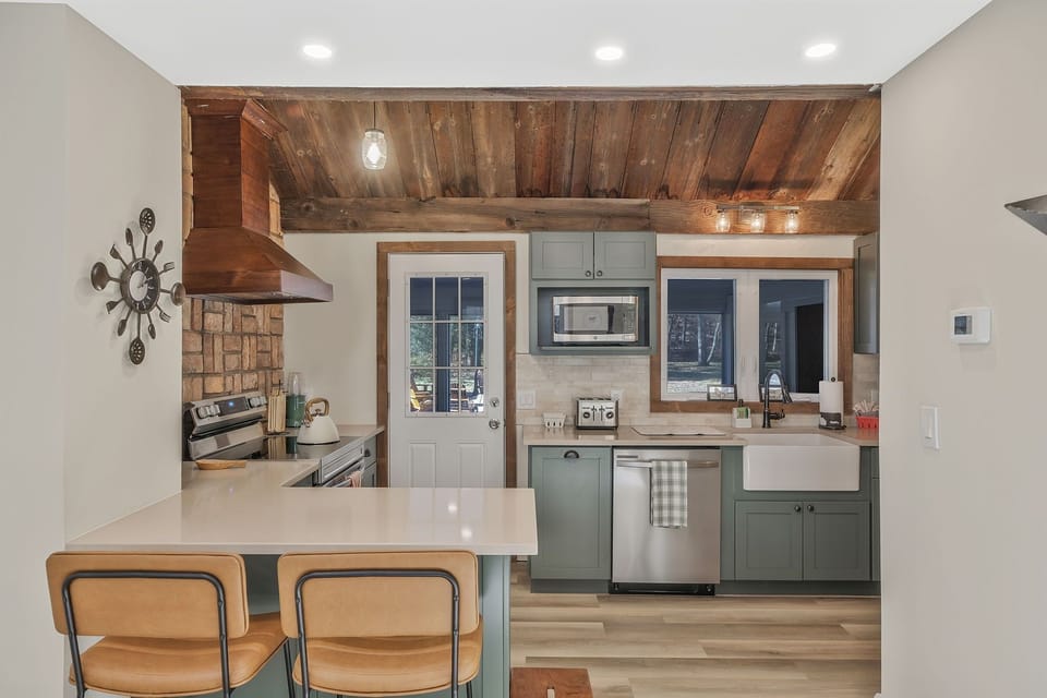 counter seating in this gorgeous and updated kitchen. Stocked with essentials