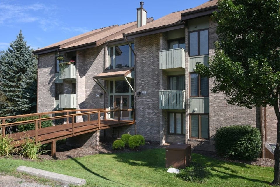 Charming mountain villa exterior surrounded by natural beauty, with a private retreat feel just steps from adventure.