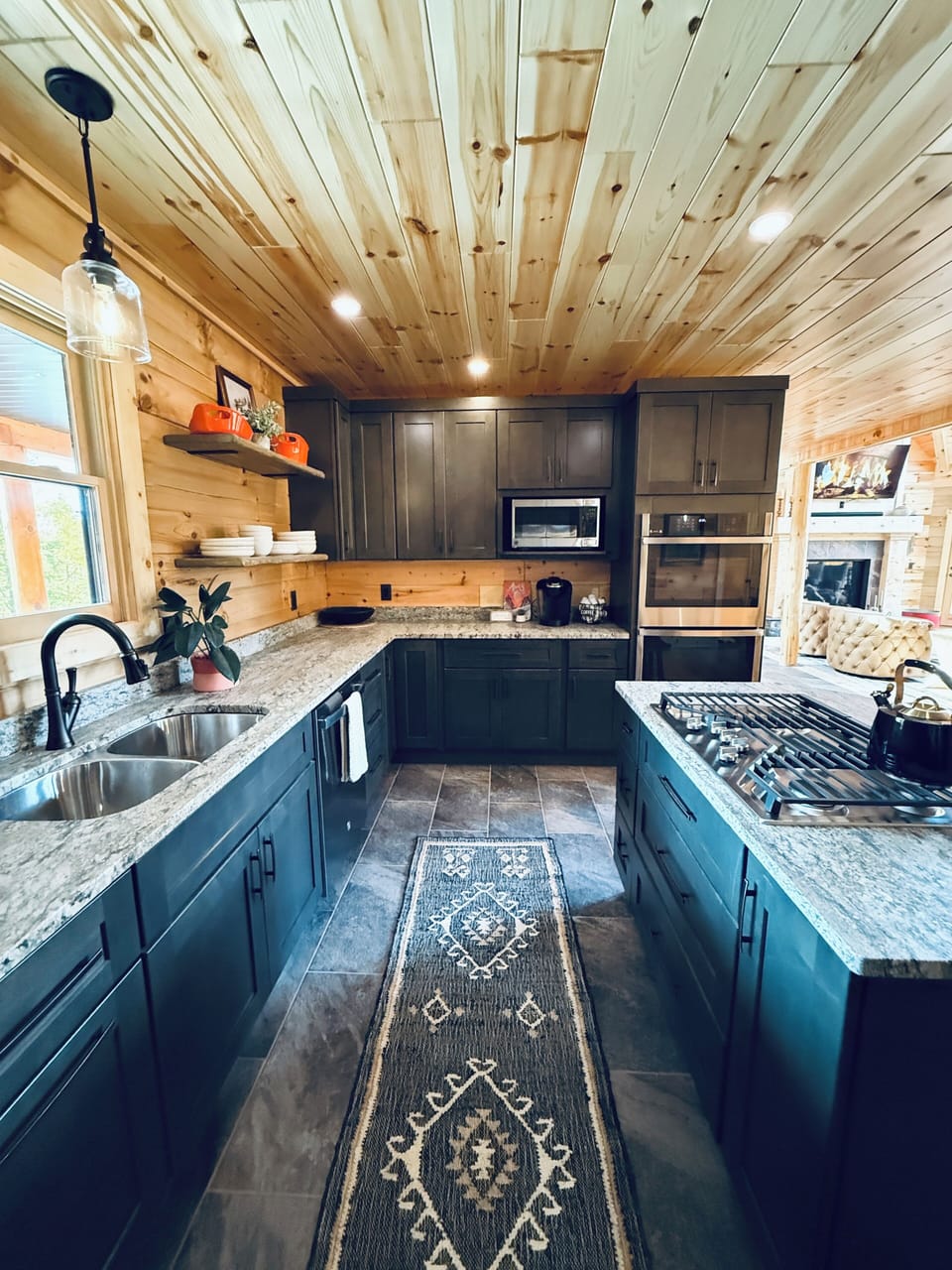 View of kitchen facing over/microwave