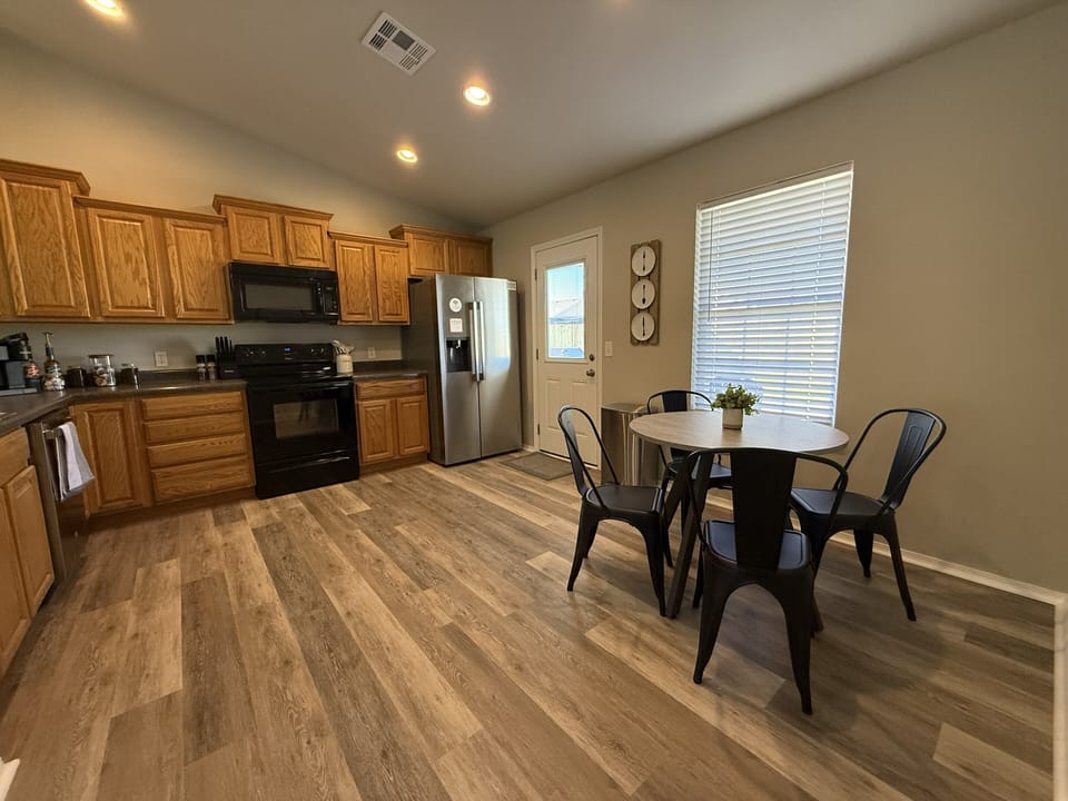 Full kitchen with dining table