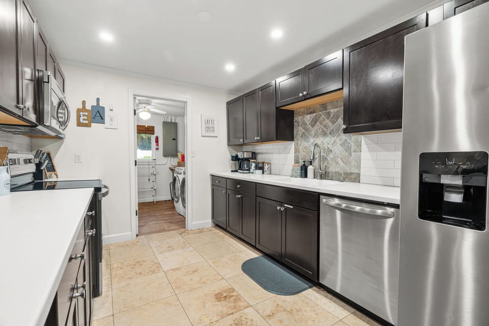 The countertops are spacious to provide plenty of room for preparing meals.