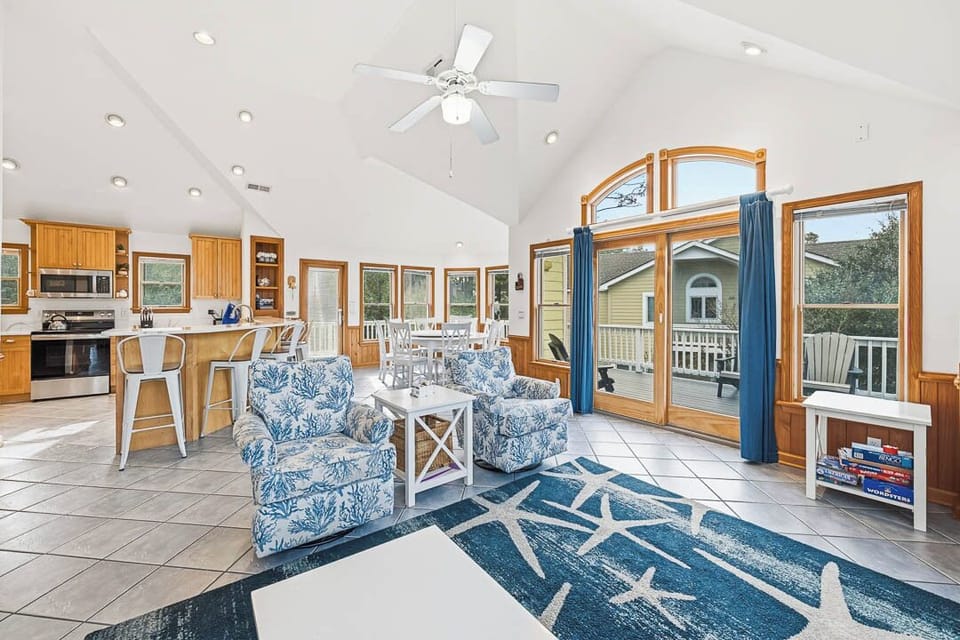 Top-Level Living Room with Deck Access