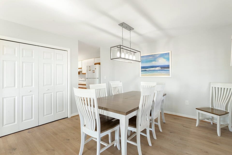 Share family meals or game nights in this welcoming dining space designed for togetherness.