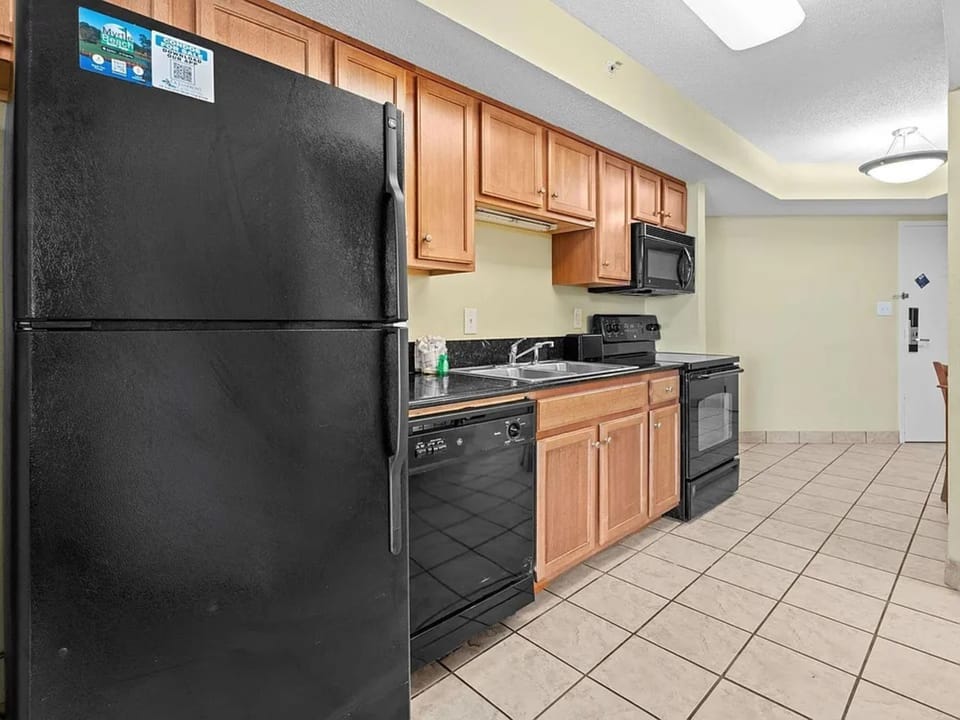 Bright, tidy kitchen with all essentials for a comfortable stay.